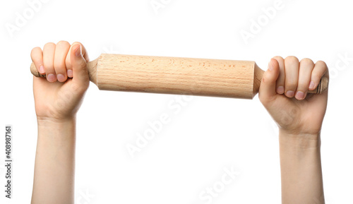 Two hands holding a wooden ...