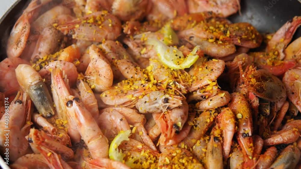 fried shrimp close-up with spices and lemon. selective focus. Sea food fried shrimp close-up with spices and lemon. selective focus. Sea food