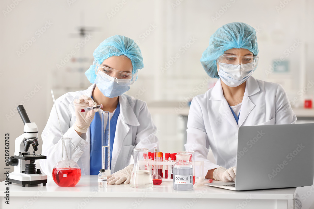 Scientists developing covid-19 vaccine in laboratory