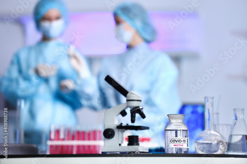 Bottle of covid-19 vaccine ...