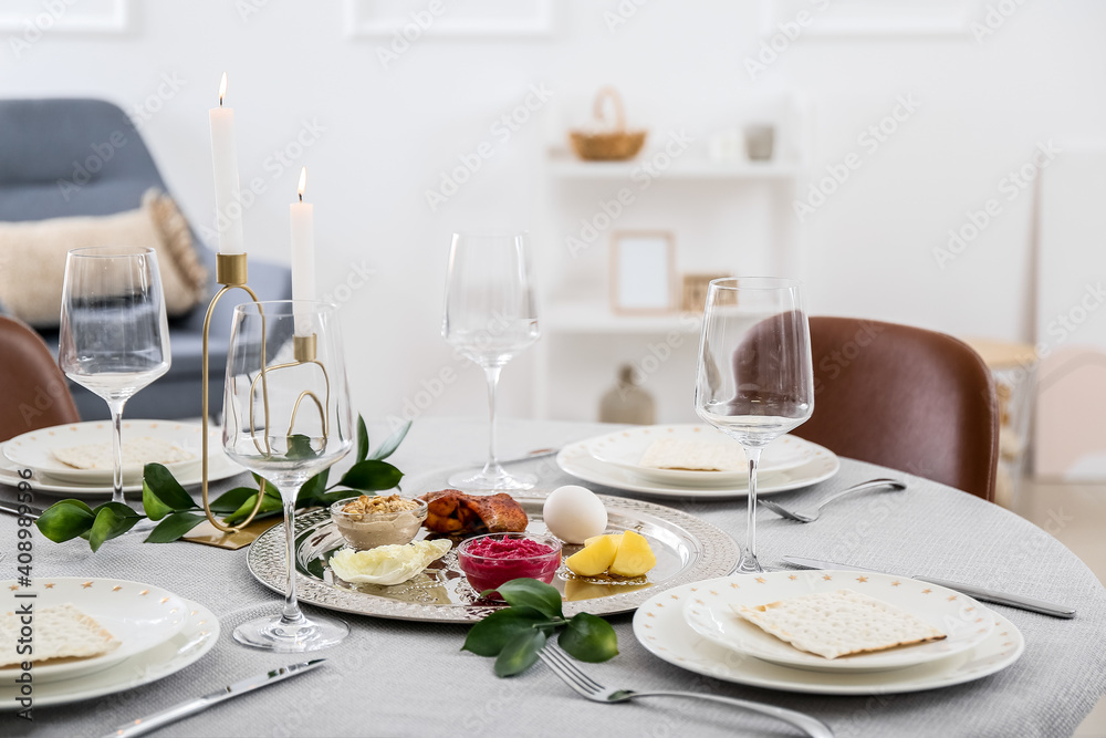 Passover Seder plate with traditional food on served table
