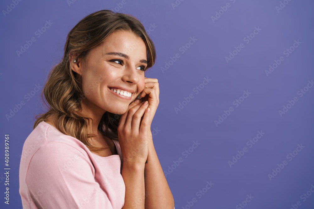 Happy beautiful nice girl smiling and looking aside Happy beautiful nice girl smiling and looking aside