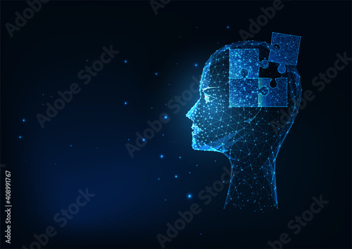 Futuristic glowing low polygonal human head with puzzles elements for psychology or medical