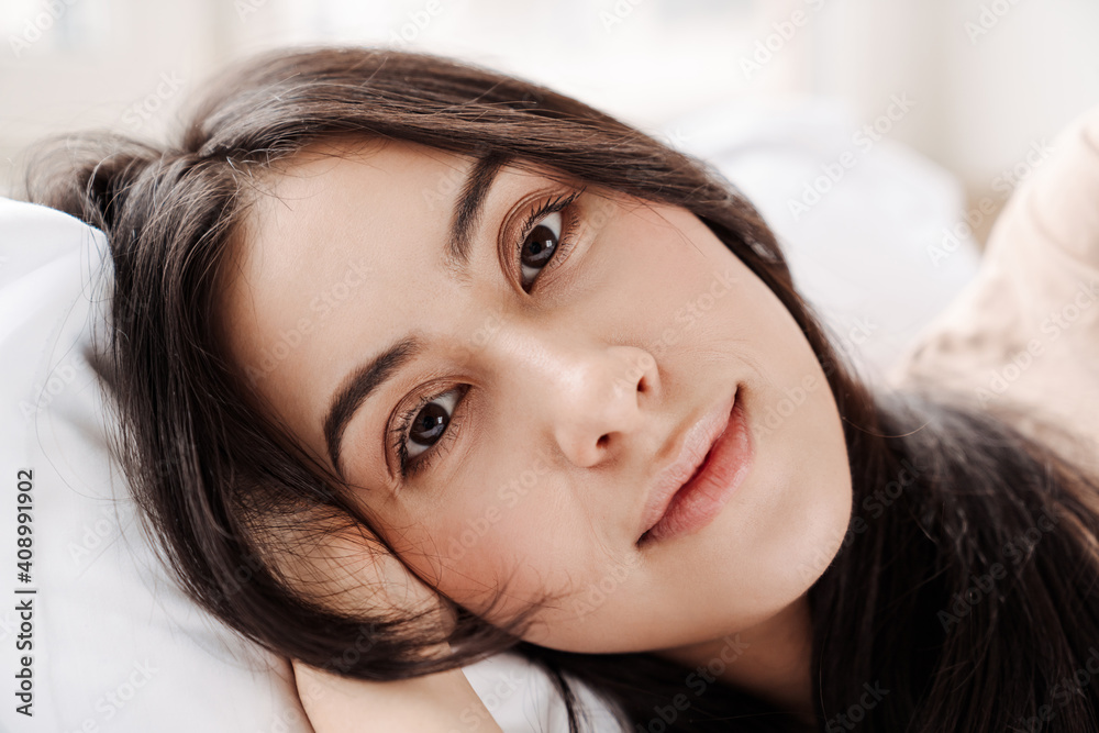 Close up of an attractive smiling young woman Close up of an attractive smiling young woman