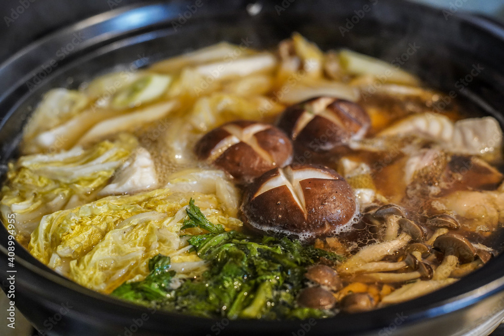 Hotpot of Japanese cuisine with lots of mushrooms and vegetables Hotpot of Japanese cuisine with lots of mushrooms and vegetables