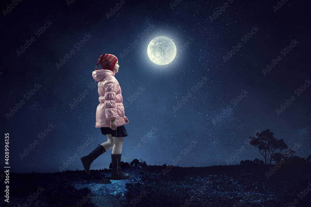 Little girl walking at night alone
