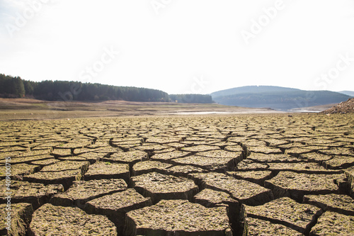 The drought bottom of the an empty dam in Bulgaria. Hot weather and climate changes makes the dam almost empty in 2021. Climate disaster. photo