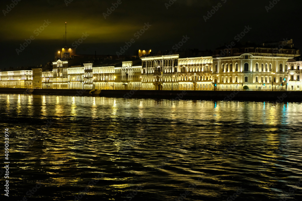 Neva river embankment at night time in Saint-Petersburg. Travel in Russia concept. Beautiful places in Russia.