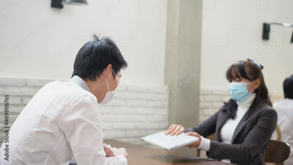 Business people is elbow bump new greeting for new normal. Teamwork for business Business people is elbow bump new greeting for new normal. Teamwork for business
