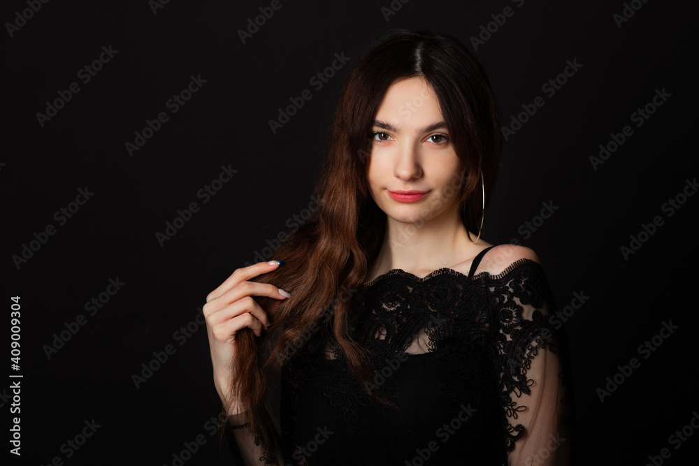 beautiful young woman with makeup on black background beautiful young woman with makeup on black background
