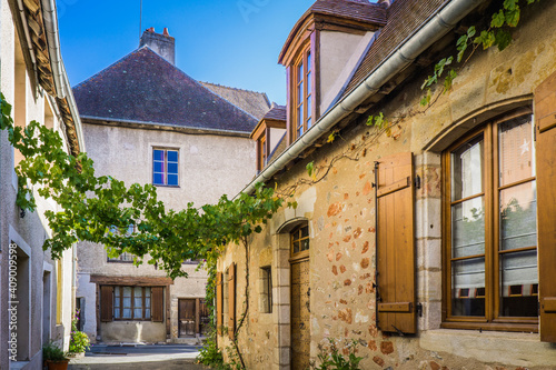 the quaint streets in the small medieval village of Herisson  situated in Auvergne  France 