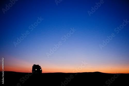 Four Wheel Drive silhouette in the desert.