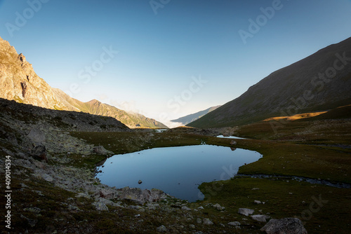alpine lake in the summer in the mountains of the Teberda Nature Reserve in the Karachay-Cherkess Republic
