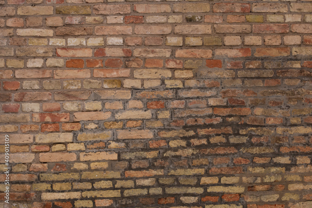 Obraz premium Old aged yellow orange red brick wall background texture