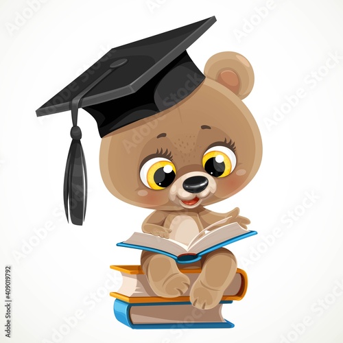 Cute cartoon baby bear in graduate hat sitting on a stack of books and reading isolated on white background