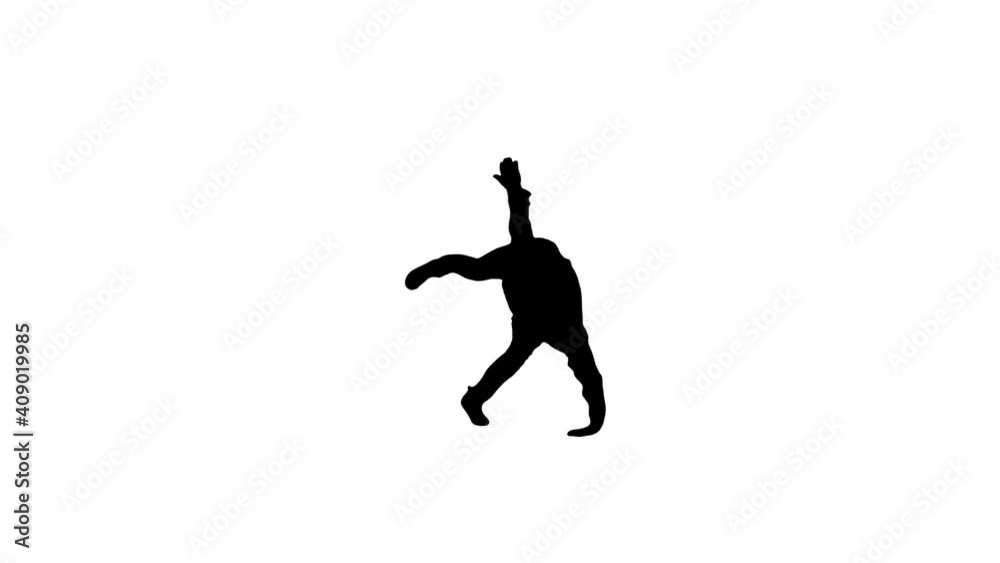 Silhouette Young man dressed in white shirt and black pants dancing break-dance and smiling at camera at the end. Silhouette Young man dressed in white shirt and black pants dancing break-dance and smiling at camera at the end.