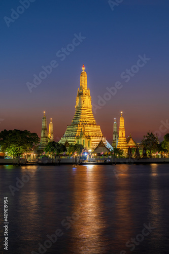 Wat Arun or temple of dawn is a travel destination and historic landmark of bangkok Thailand. The famous and beautiful architecture pagoda located near Chaopraya river.