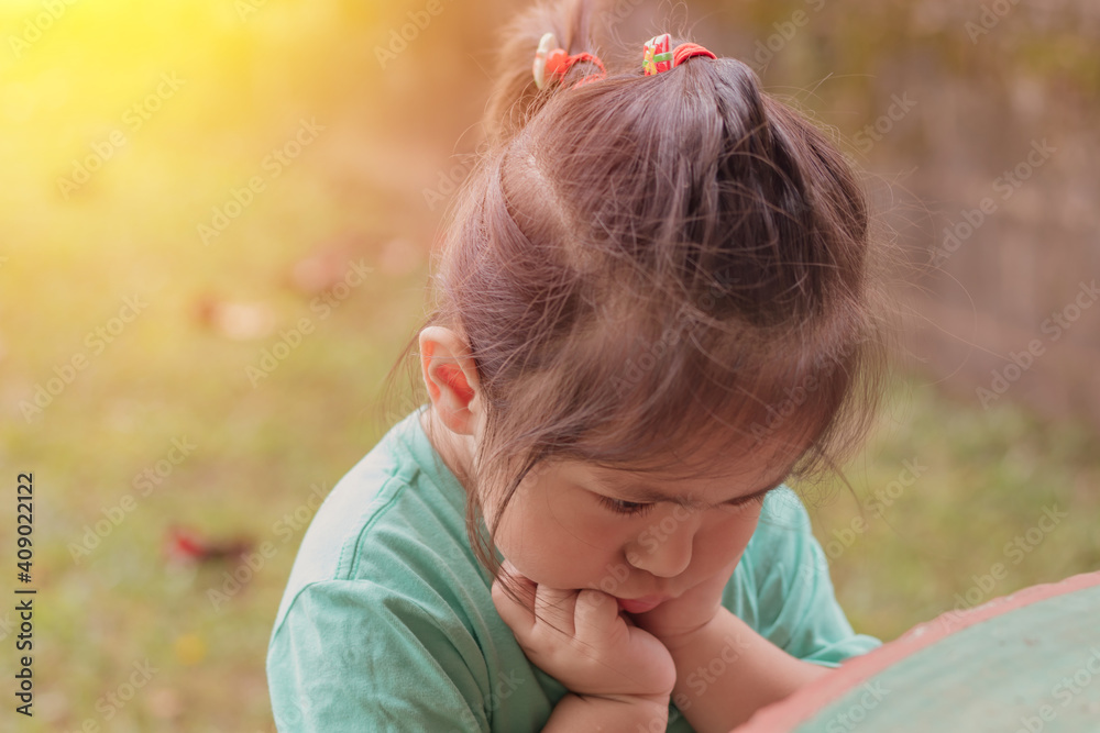Close-up of an Asian kid girl frustrating and crying and sad.She has a negative attitude,ADHD concept. Close-up of an Asian kid girl frustrating and crying and sad.She has a negative attitude,ADHD concept.