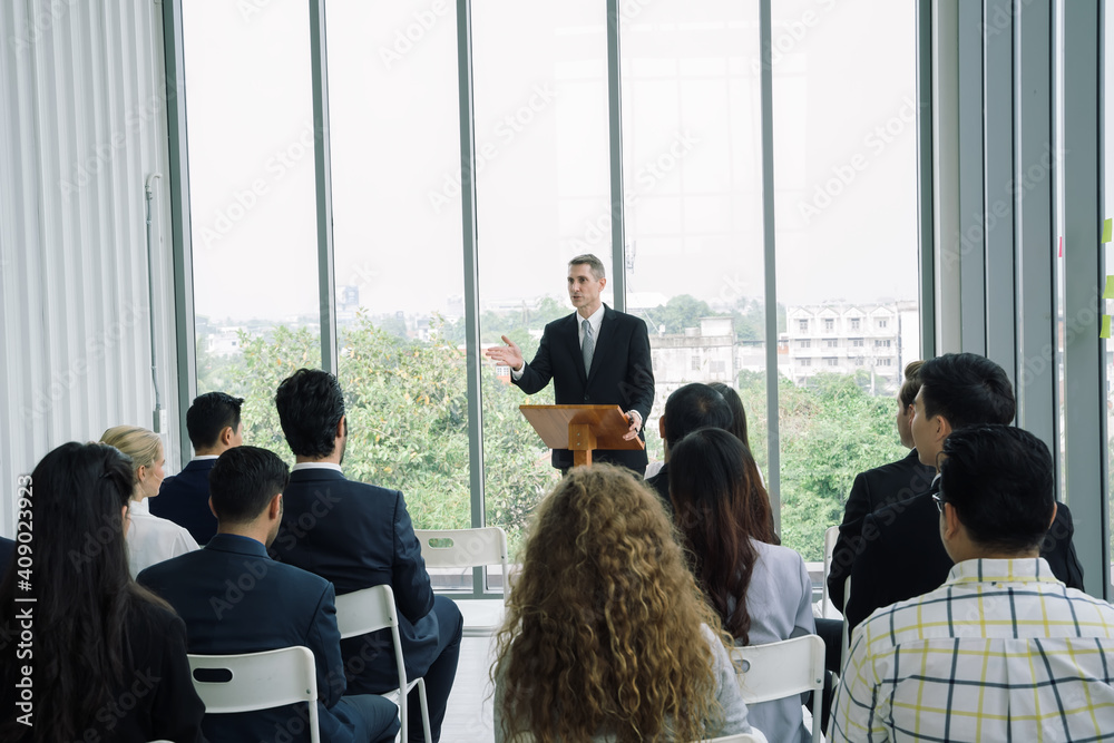 Successful business professionals presenting analytical report and discussing something while meeting in the office. Successful business professionals presenting analytical report and discussing something while meeting in the office.
