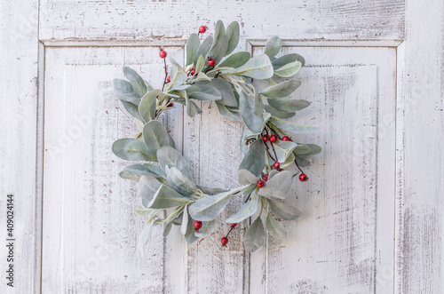 Lamb's Ear with red berries wreath on white antique door