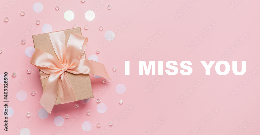 Gifts on pink background, love and valentine concept with text I miss you