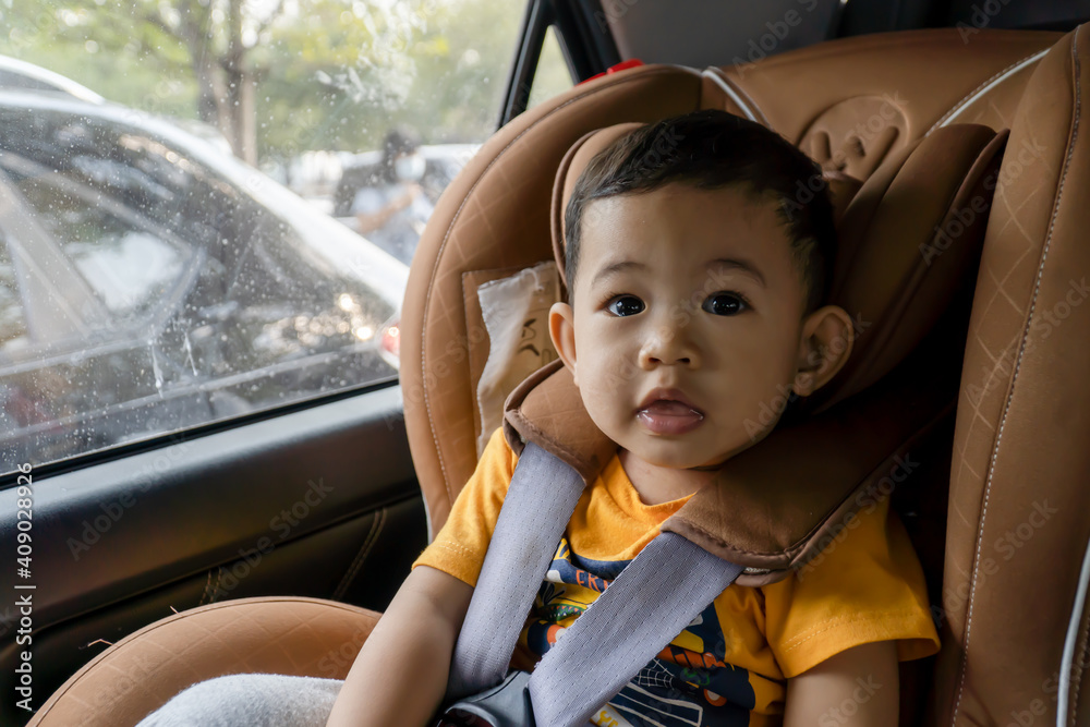 Boy in car clearance seat