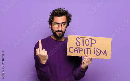 young bearded man stop capitalism concept photo