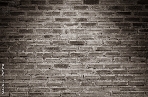 Old black brick wall texture background 