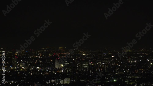 Wallpaper Mural TOKYO, JAPAN : Aerial high angle sunset CITYSCAPE of TOKYO and MOUNT FUJI. Huge golden sun sinking behind mountains. Japanese city life and nature concept. Long time lapse shot dusk to night. Torontodigital.ca