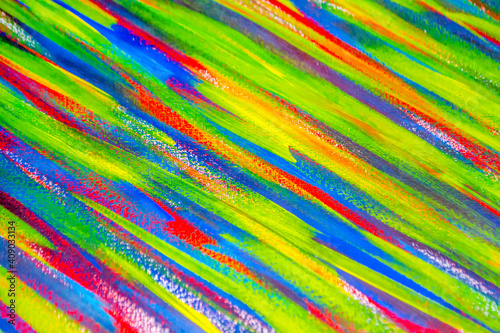 Background from different strokes of red, yellow, green and blue paint © mari1408