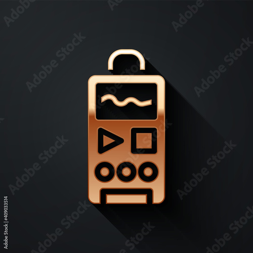 Gold Dictaphone icon isolated on black background. Voice recorder. Long shadow style. Vector.