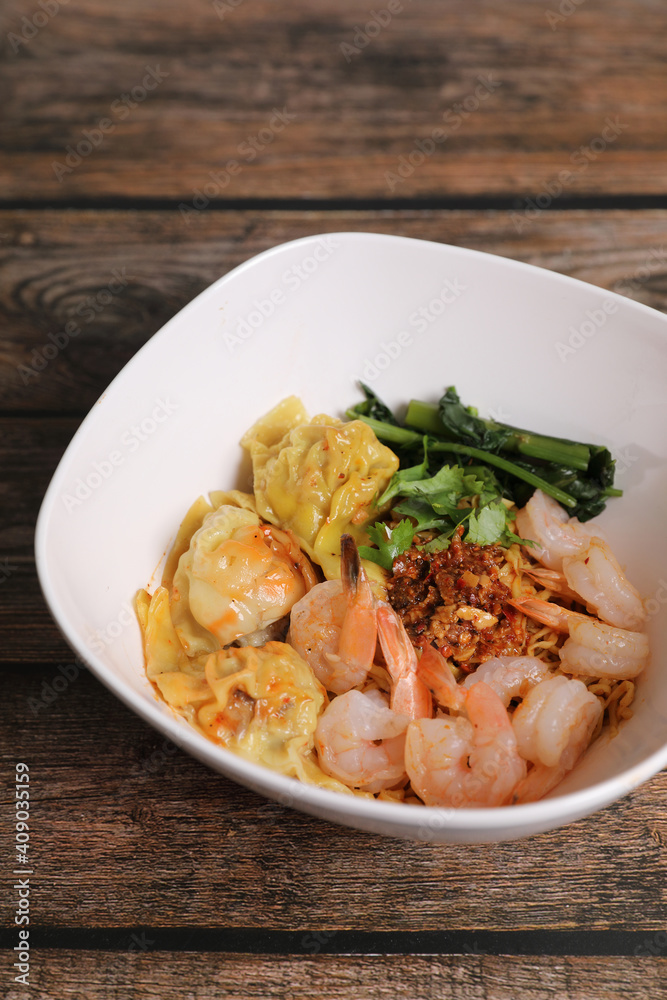 Shrimp dumpling with shrimp on wood background Shrimp dumpling with shrimp on wood background