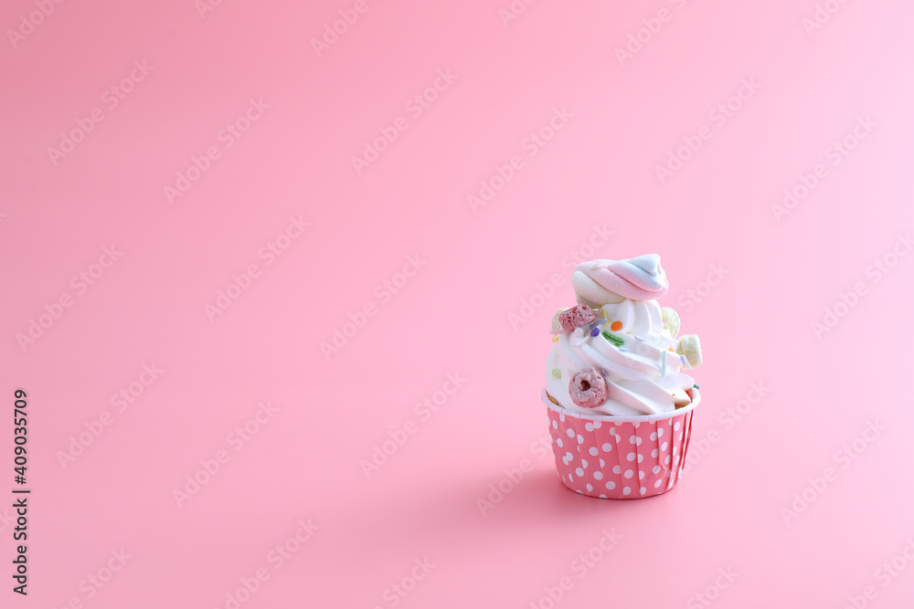 cupcake isolated in pink background cupcake isolated in pink background
