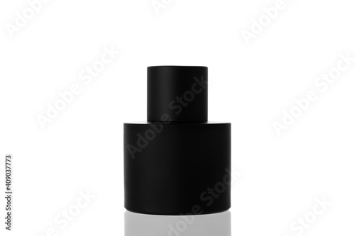 Black matte perfume bottle isolated on white background.