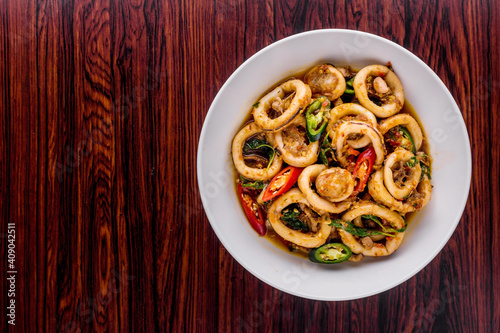 Spicy fried squid with basil leaves