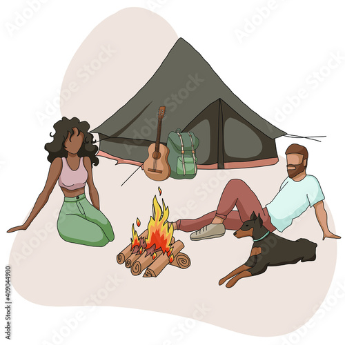 Boy and girl camping with dog