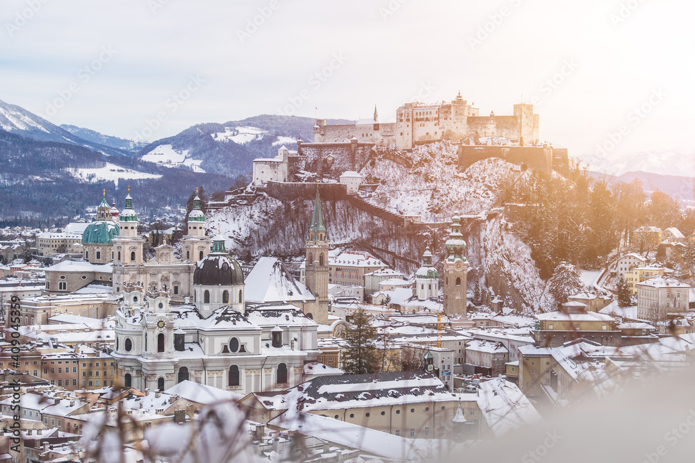 Panorama of Salzburg in winter: Snowy historical center and old city, sunshine