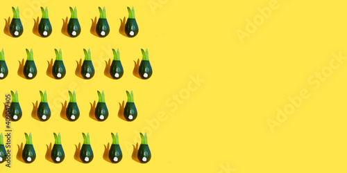Colorful pattern of avocado bunny on bright background.