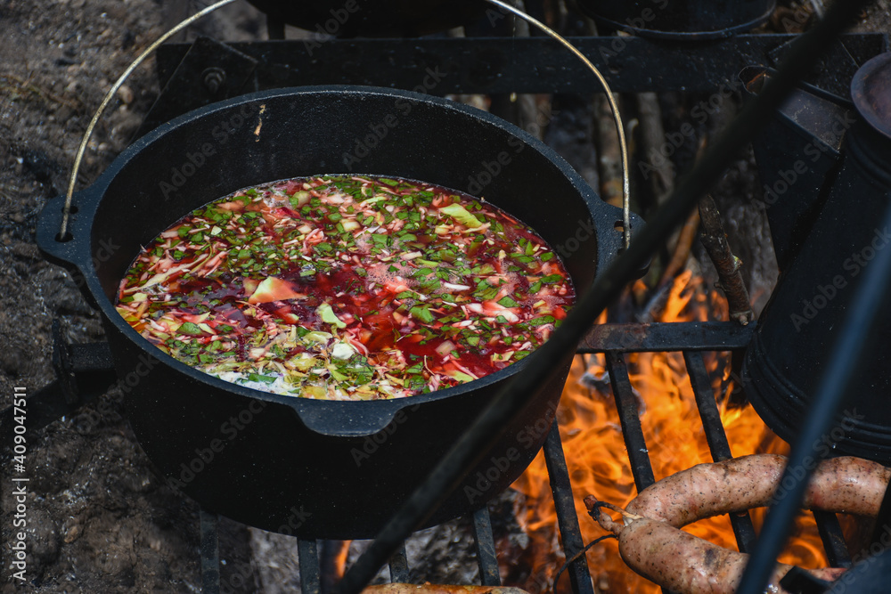 Ukrainian borsch cooking on the grill Ukrainian borsch cooking on the grill