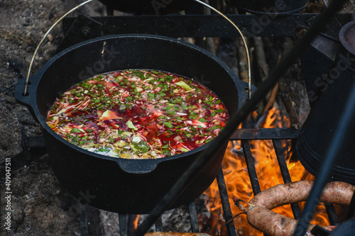 Ukrainian borsch cooking on the grill