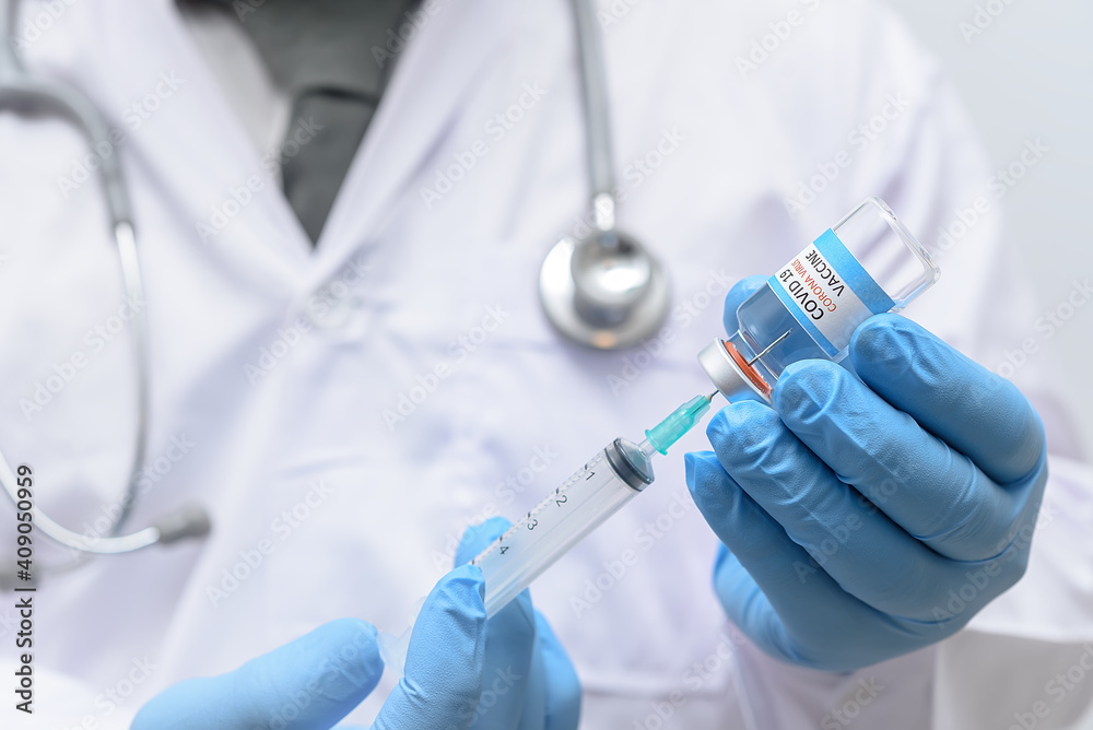 Vaccine injection,The doctor is preparing the vaccine and Syringe tube to Treatment sick person.Concept covid-19 vaccination medicine