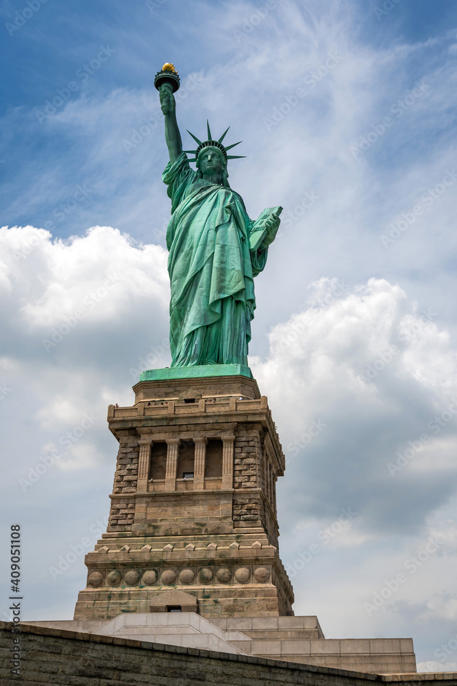 Obraz premium Statue of Liberty on Liberty Island closeup with blue sky in New York City Manhattan 