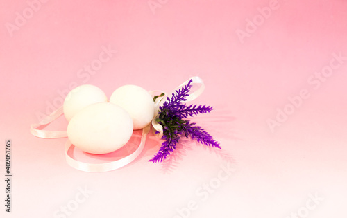 Colorful Easter eggs with spring blossom flowers