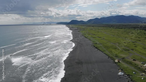 Flying over Khalaktyrsky on Kamchatka peninsula, Russia, Pacific ocean. 