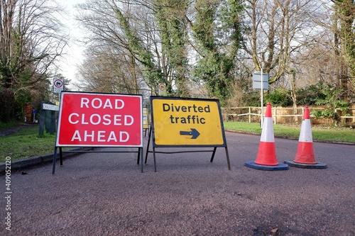 Road ahead closed and diversion signs
