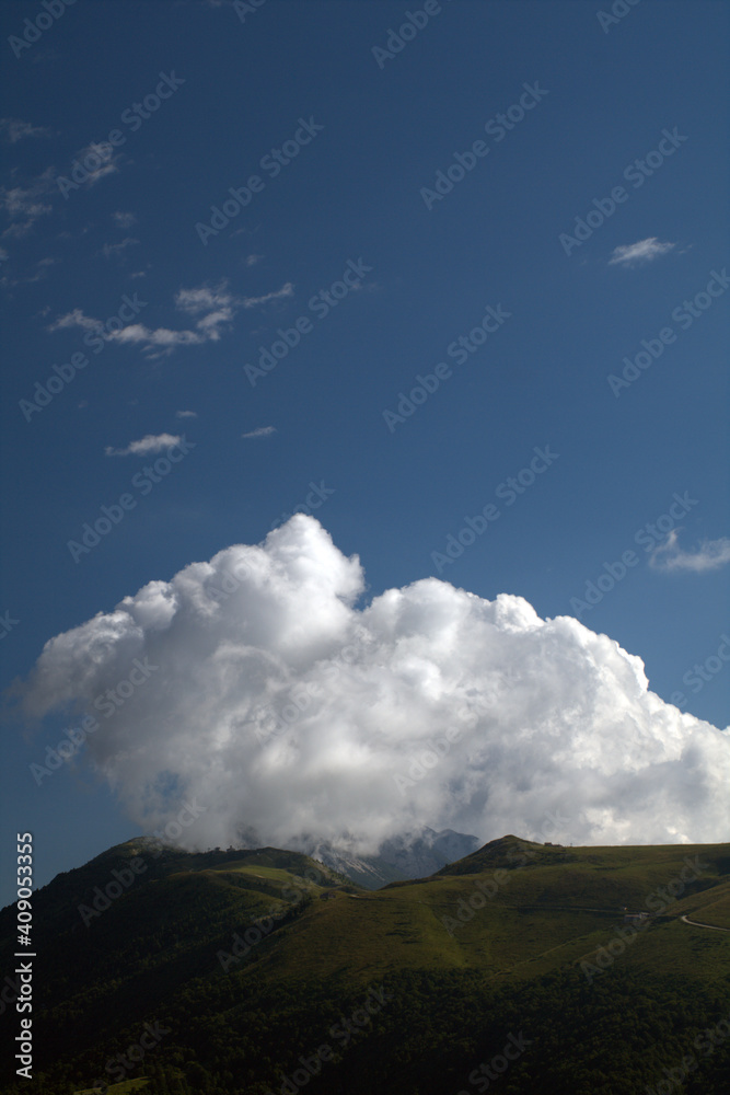 clouds over the mountain,nature, cloud, blue,landscape,sky,summer, view, green, white, beautiful, grass, cloudy,cloudscape, panorama, weather, travel, beauty, outdoor, day,