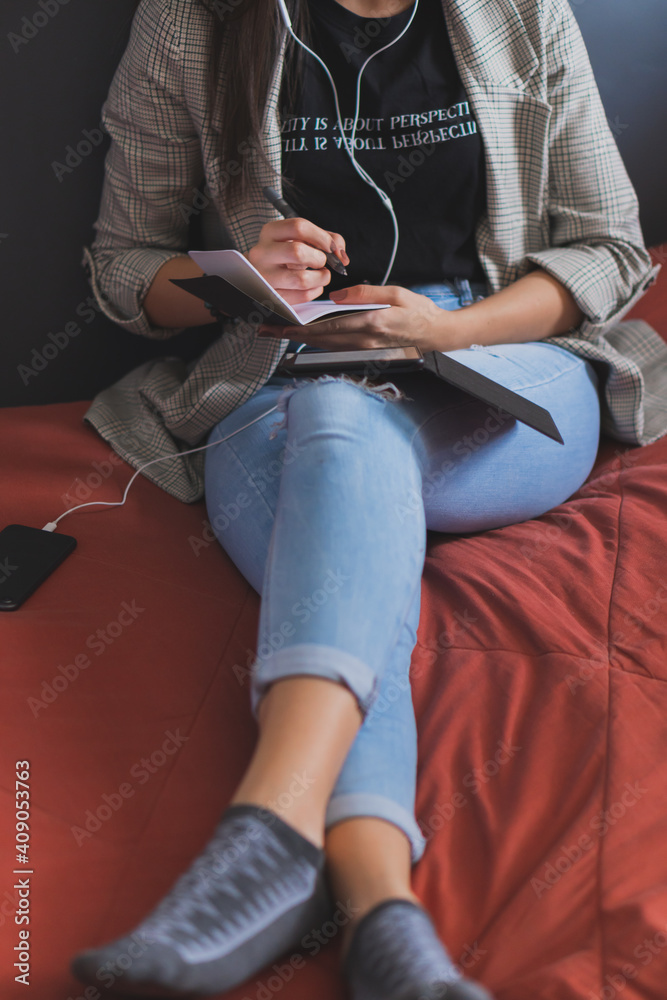 Young woman reading an electronic book. Young woman reading an electronic book.