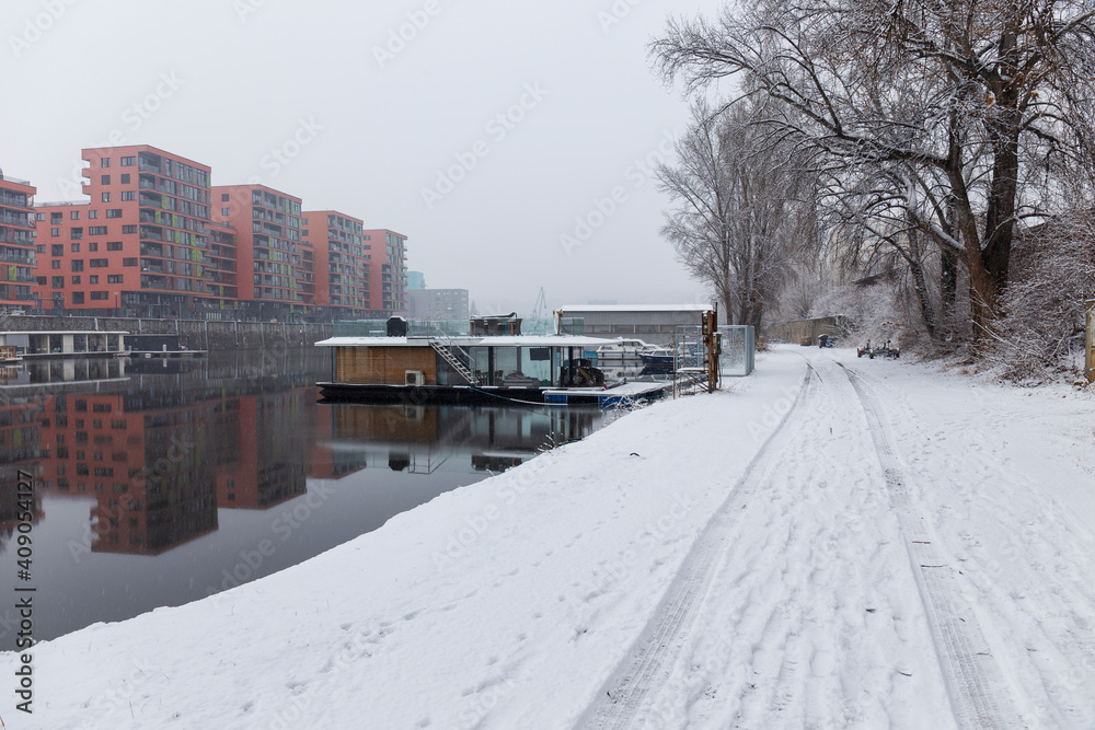 Fototapeta premium Snowy winter Harbor above River Vltava, Holesovice, the most cool Prague District, Czech Republic