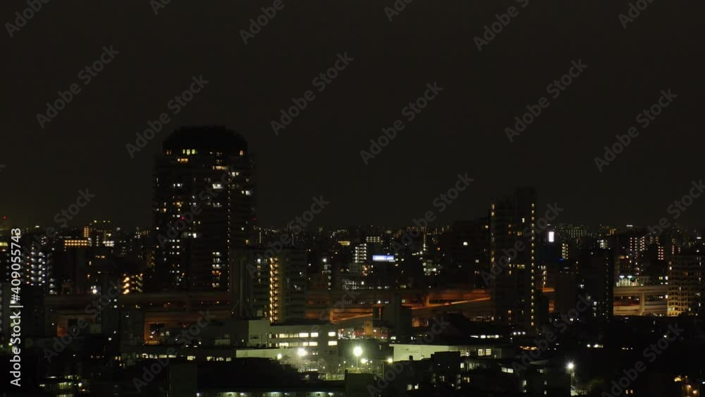 TOKYO, JAPAN : Aerial high angle sunrise CITYSCAPE of TOKYO and MOUNT FUJI. View of houses at residential area. Japanese city life and nature concept. Long time lapse zoom out shot night to morning. TOKYO, JAPAN : Aerial high angle sunrise CITYSCAPE of TOKYO and MOUNT FUJI. View of houses at residential area. Japanese city life and nature concept. Long time lapse zoom out shot night to morning.