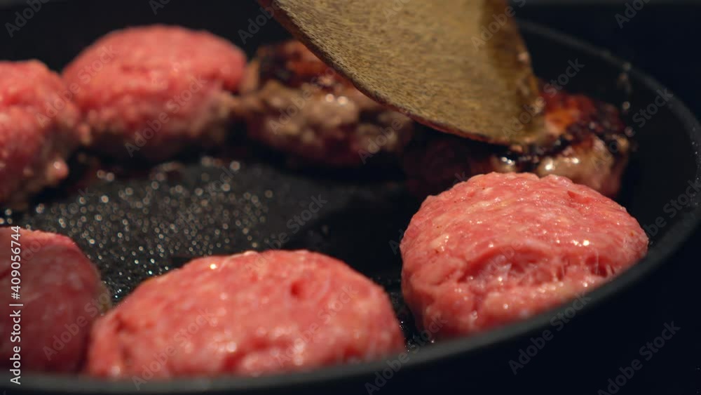 beef cutlets are fried in a pan close-up. grilled meat beef cutlets are fried in a pan close-up. grilled meat
